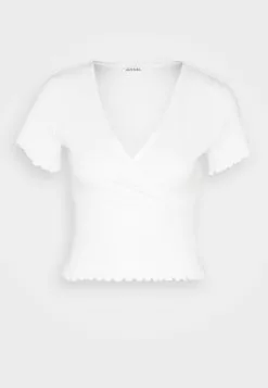 Monki T-Shirt Basic - White Light Unique 12 Monki T-Shirt Basic - White Light Unique -Monki Verkoop 50a2082b8cd24e4d847577837e05afde